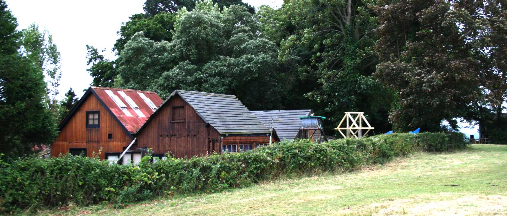 Wooden generating station dating from 1900, panoramic view of Lyme Park from Herstmonceux village